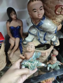 Tượng chú tiểu &amp; phật ký cây.