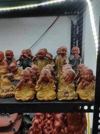 Tượng chú tiểu &amp; phật ký cây.